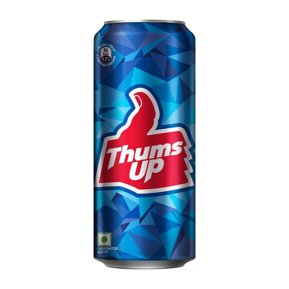 A blue Thums Up soda can with a red thumbs-up logo and geometric patterns.